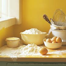 A Baking Mishap of Flour, Eggs and a Messy Kitchen Counter.