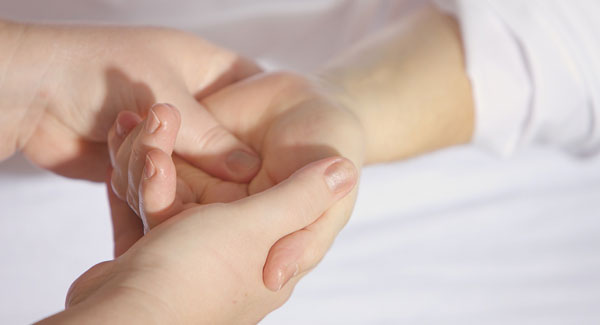 Mother Holding Childs Clean Hand.